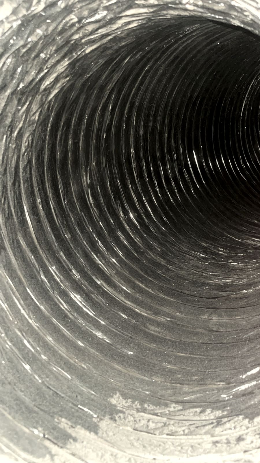 Looking down the inside of a round flex duct.